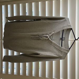 The color is a metallic gray. Great for evening or daytime wear